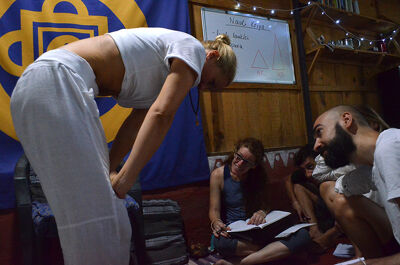 Consciousness of Fire - Liisa demonstrates for students the correct performance of Uddiyana Banda